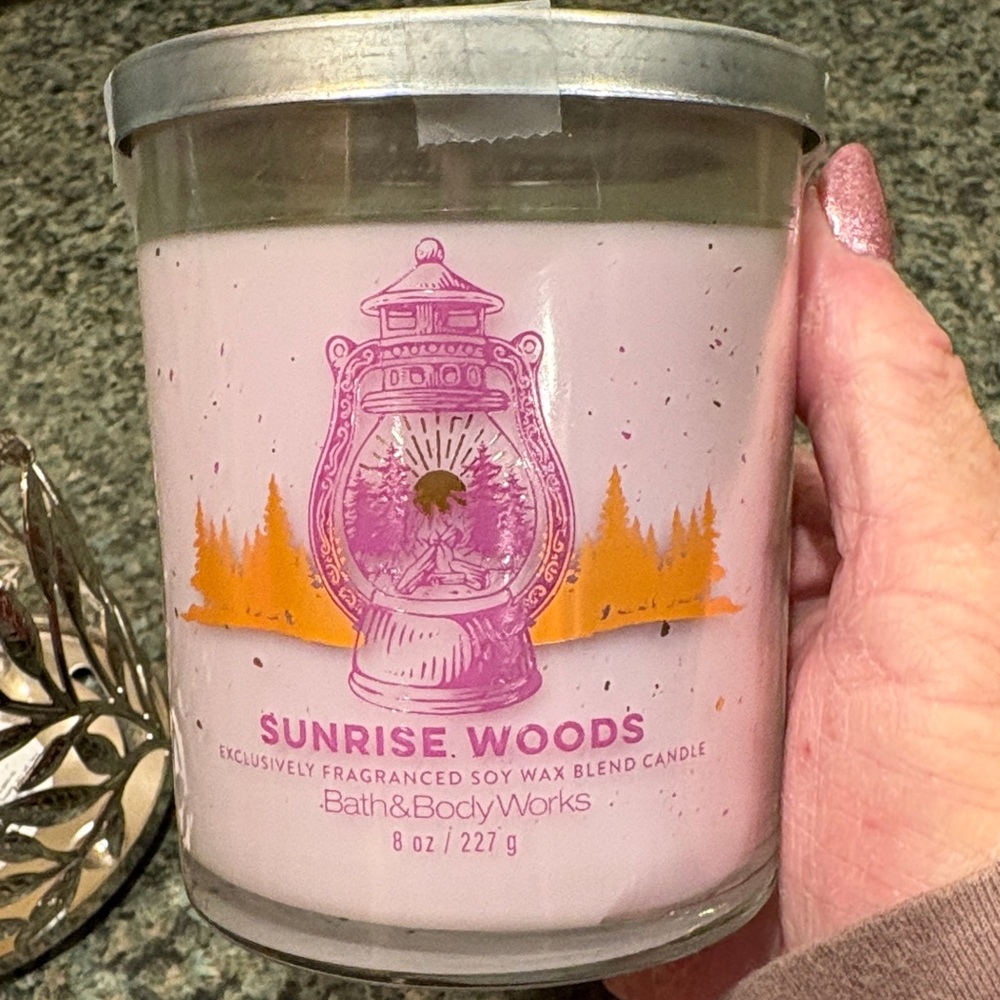 Nwt Bundle of a single Wick “Sunshine Woods” Candle with a New Silver Holder